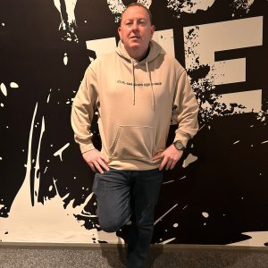 Gra Duit hoodie solo launch wall shot