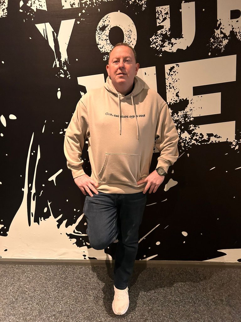 Gra Duit hoodie solo launch wall shot