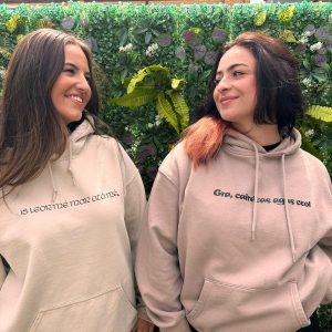 Gra Duit hoodie front text ivy wall shot
